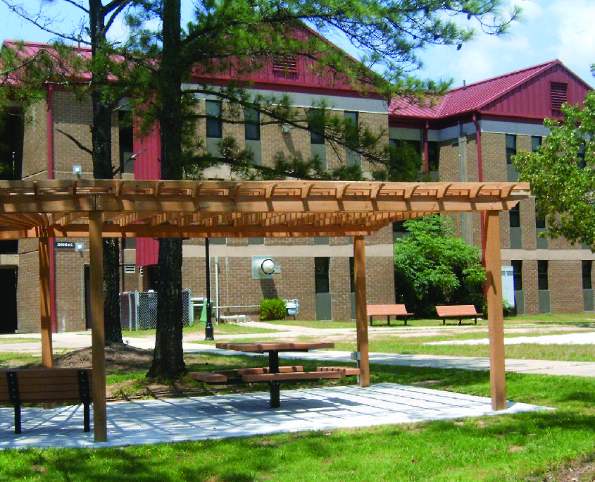 Barracks with a pergola in front at Fort Gordon in Georgia
